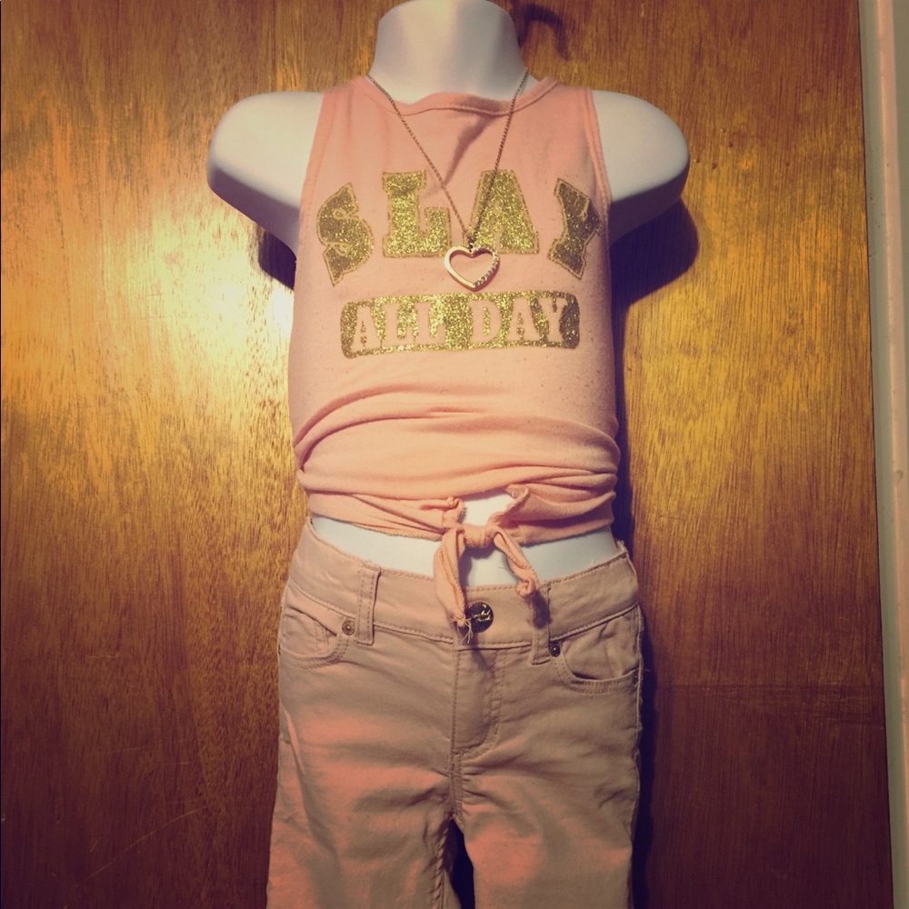 Pair of peach colored L.O.G.G. Jeans size 3-4y